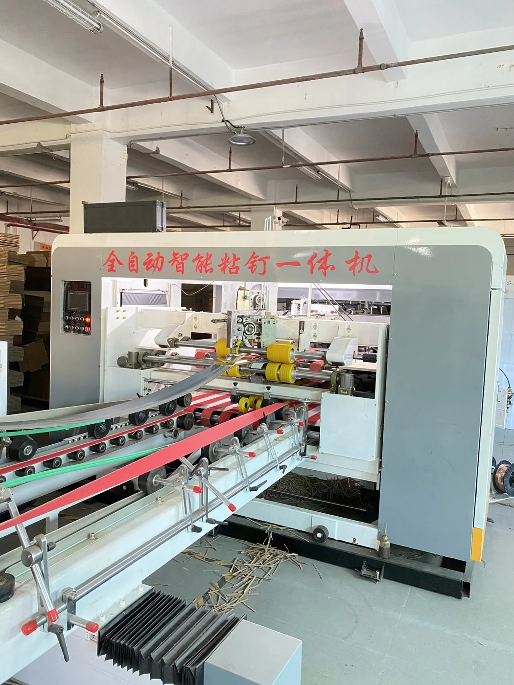 Automatic gluer-stitcher line at Jindong Packaging