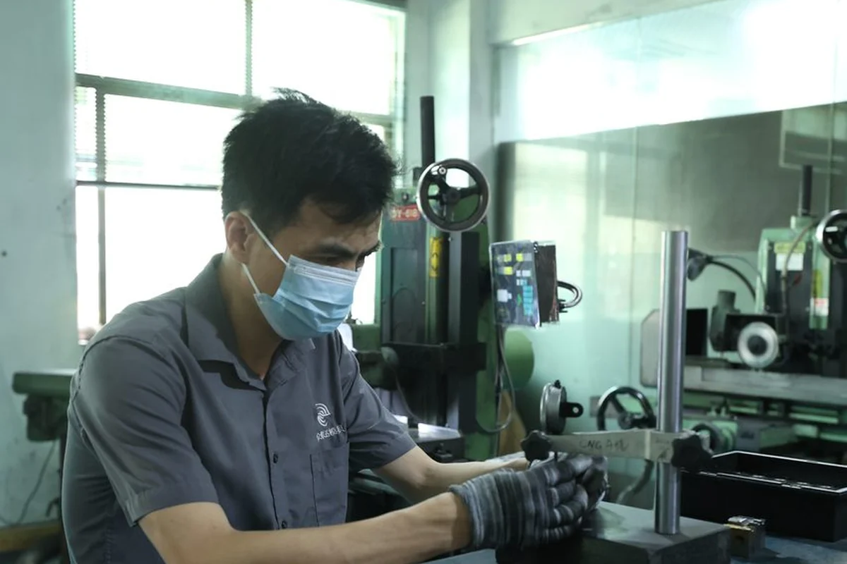 ZLD Precision Mold facility &middot; Operator at Machine